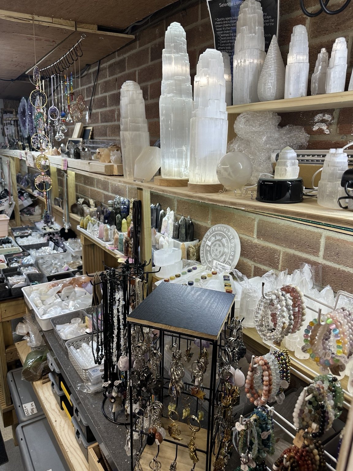 Wide view of crystal displays inside the Spirit & Soul Crystals cabin